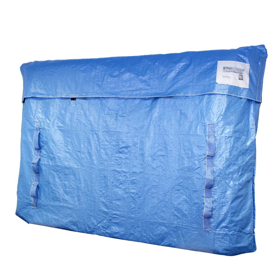 Blue reusable mattress bag with envelope style closure protecting a double mattress inside.