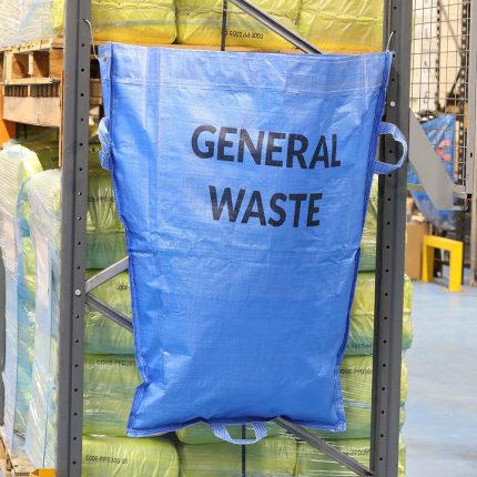 Warehouse waste and recycling sack hanging from racking